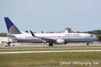 N76505 @ KSRQ - United Flight 1182 (N76505) departs Sarasota-Bradenton International Airport enrout to Chicago-O'Hare International Airport - by Donten Photography