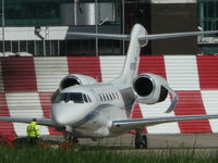 N750GF @ EGCC - on the ocs ramp being towed back into the hanger - by packo