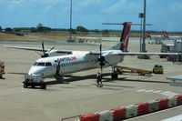 VH-QOT @ YBBN - At Brisbane - by Micha Lueck