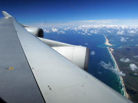 ZK-NBV @ YBBN - Hitting Australia's East Coast on approach to Brisbane - by Micha Lueck