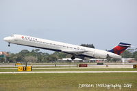 N939DN @ KSRQ - Delta Flight 2298 (N939DN) departs Sarasota-Bradenton International Airport enroute to Hartsfield-Jackson International Airport - by Donten Photography