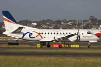 VH-TRX @ YSSY - taxiing from 34R - by Bill Mallinson