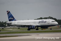 N598JB @ KSRQ - JetBlue Flight 741 (N598JB) Me & You & A Plane Named Blue arrives at Sarasota-Bradenton International Aiport following a flight from Boston-Logan International Airport - by Donten Photography