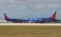 N715SY @ MIA - Sun Country 737-700 - by Florida Metal