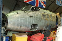 G-ANUW @ EGNX - undergoing restoration at the East Midlands Aeropark - by Chris Hall