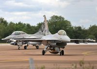 671 @ EGVA - Arriving RIAT 2012 with F16 692 - by John Coates