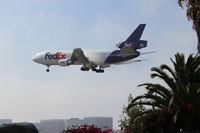 N308FE @ KLAX - FedEx Express. MD-10-30F. N308FE cn 48297 41. Los Angeles - International (LAX KLAX). Image © Brian McBride. 11 May 2013 - by Brian McBride