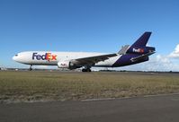 N575FE @ YSSY - FedEx Express. MD-11F. N575FE cn 48500 493. Sydney - Kingsford Smith International (Mascot) (SYD YSSY). Image © Brian McBride. 01 August 2012 - by Brian McBride