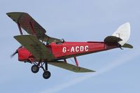 G-ACDC @ EGKH - Seen overflying runway 28 at EGKH,  the second oldest flying Tiger Moth in the World. - by Derek Flewin