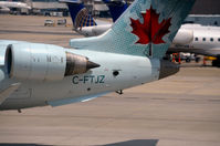 C-FTJZ @ KIAH - Maple Leaf and engine Houston - by Ronald Barker
