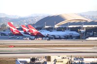 VH-OJC @ KLAX - Qantas threesome at LAX TBIT. - by speedbrds