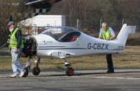 G-CBZX @ EGHH - Off for a walk - by John Coates