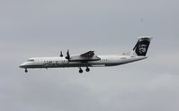 N412QX @ KSEA - DHC-8-402