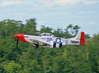 N10601 @ KRDG - The Commemorative P-51D Mustang Red Nose zooms by, taking a very lucky passenger aloft. - by Daniel L. Berek