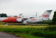 OO-TAQ @ EXT - Parked Exeter Airport, North side storage area, seems to have been withdrawn from service. - by Jean M Braun