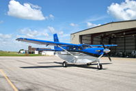 N82HK @ KCID - On the Collins Ramp - by Glenn E. Chatfield