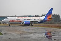 G-GDFO @ EGHH - Snowy departure after repaint - by John Coates