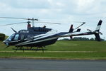 G-RCOM @ EGBT - ferrying race fans to the British F1 Grand Prix at Silverstone - by Chris Hall