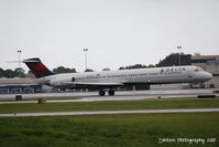 N989DL @ KSRQ - Delta Flight 2298 (N989DL) arrives at Sarasota-Bradenton International Airport following a flight from Hartsfield-Jackson Atlanta International Airport - by Donten Photography