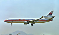 B-2171 @ VHHH - McDonnell Douglas MD-11 [48495] (China Eastern Airlines) Hong Kong Kai-Tak~B 01/11/1997 - by Ray Barber