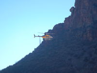 N569T - January of 2014 I was hiking to Indian ruins in Devil's Chasm canyon Arizona.  This Helicopter (N569T) flew through the canyon. I'm not sure who's view was better, theirs or ours. - by Troy Dixon-Sekaquaptewa
