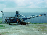 WG718 @ EGDY - Scanned from print. Dragonfly HR.3 WG718 (FAAM reject) on the fire dump at RNAS Yeovilton November '78. In foreground is propeller assembly from nearby Gannet COD.4  XA454 (see photo) - by Clive Pattle