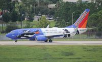 N280WN @ MCO - Southwest Penguin One 737-700 - by Florida Metal