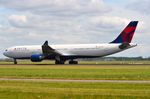 N819NW @ EHAM - Delta A333 thundering down the runway. - by FerryPNL