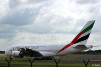 A6-EEW @ EGCC - Viewed at close quarters passing the viewing enclosure aat Manchester Airport. - by Clive Pattle
