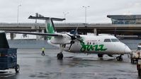 C-GONY @ CYYZ - Air Canada Jazz Dash 8 on a rainy morning. - by M.L. Jacobs