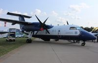 N803MR @ KOSH - DHC-8-202