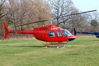 G-BEWY @ EGBC - Bell 206B  Jet Ranger II [348] Cheltenham Racecourse~G 14/03/2012. Polo logo removed. - by Ray Barber