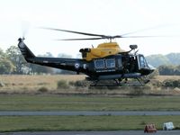 ZJ242 @ EGFH - Vising Griffin helicopter coded E of 60 (R) squadron RAF departing. - by Roger Winser