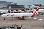 C-FMWV @ EGCC - AC Rouge arriving at its gate. - by FerryPNL