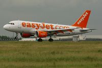 G-EZGI @ LFPG - Airbus A319-111, Landing Rwy 26L, Roissy Charles De Gaulle Airport (LFPG-CDG) - by Yves-Q