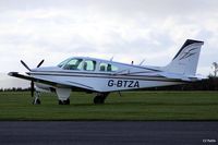 G-BTZA @ EGPT - Parked up at sunset at Perth EGPT - by Clive Pattle