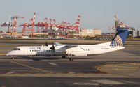 N380NG @ KEWR - DHC-8-402 - by Mark Pasqualino