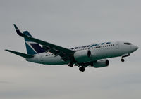 C-GWBX @ TNCM - On short finals to St Maarten. - by kenvidkid