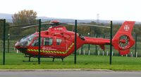 G-NWAE @ EGCB - Through the fence at City Airport Manchester Heliport - by Guitarist