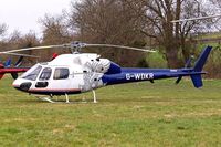 G-WDKR @ EGBC - Aerospatiale AS.355F1 Ecureuil II [5115] (Cheshire Helicopters Ltd) Cheltenham Racecourse~G 13/03/2008 - by Ray Barber