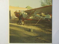 N23985 - Looks to be my dads old plane same number. Pic taken in International Falls MN Our front yard. My dad standing by it and ready to go. Vary early 1970s - by Unknown my mom most likely