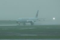 C-FNND @ YVR - Rainy day departure from YVR - by metricbolt