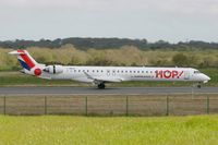 F-HMLM @ LFRB - Canadair Regional Jet CRJ-1000, Reverse thrust landing Rwy 07R, Brest-Bretagne Airport (LFRB-BES) - by Yves-Q