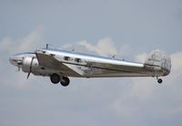 N2072 @ LAL - Lockheed 12A leaving Sun N Fun 2013 - by Florida Metal