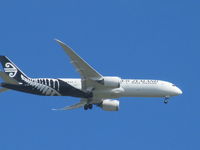 ZK-NZF @ NZAA - nearly a great shot on landing - very windy so camera moved!! - by magnaman
