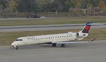 N921XJ @ KMSP - Taxiing for departure at MSP - by Todd Royer