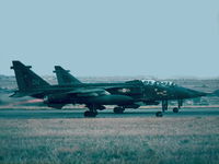 XX746 @ LMML - Sepecat Jaguars XX746/DU and XX974/DH of 31Sqd RAF taking off from RAF Luqa Malta. - by Raymond Zammit