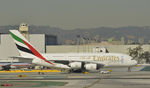 A6-EEL @ KLAX - Taxiing to gate at LAX - by Todd Royer
