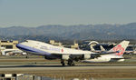 B-18717 @ KLAX - Departing LAX on 25L - by Todd Royer