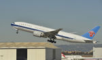 B-2081 @ KLAX - Departing LAX on 25R - by Todd Royer